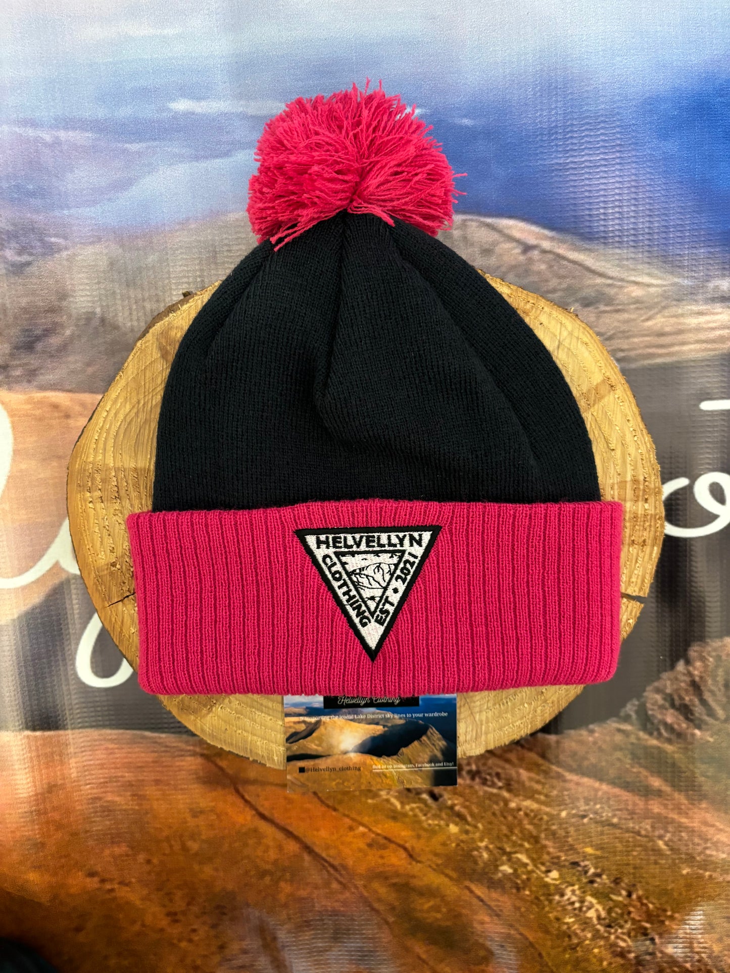 Pink and black turn up bobble hat with embroidered logo