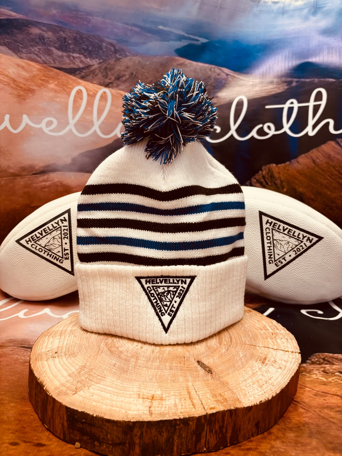 Helvellyn bobble hat, white body with brown and blue stripes