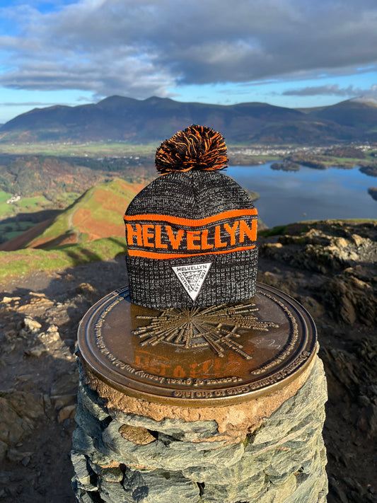 Grey and orange bobble hat
