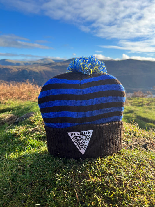 Black and blue striped bobble hat